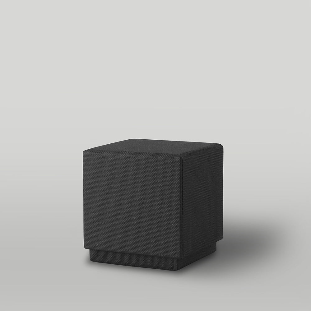 Black candle box on a light grey background