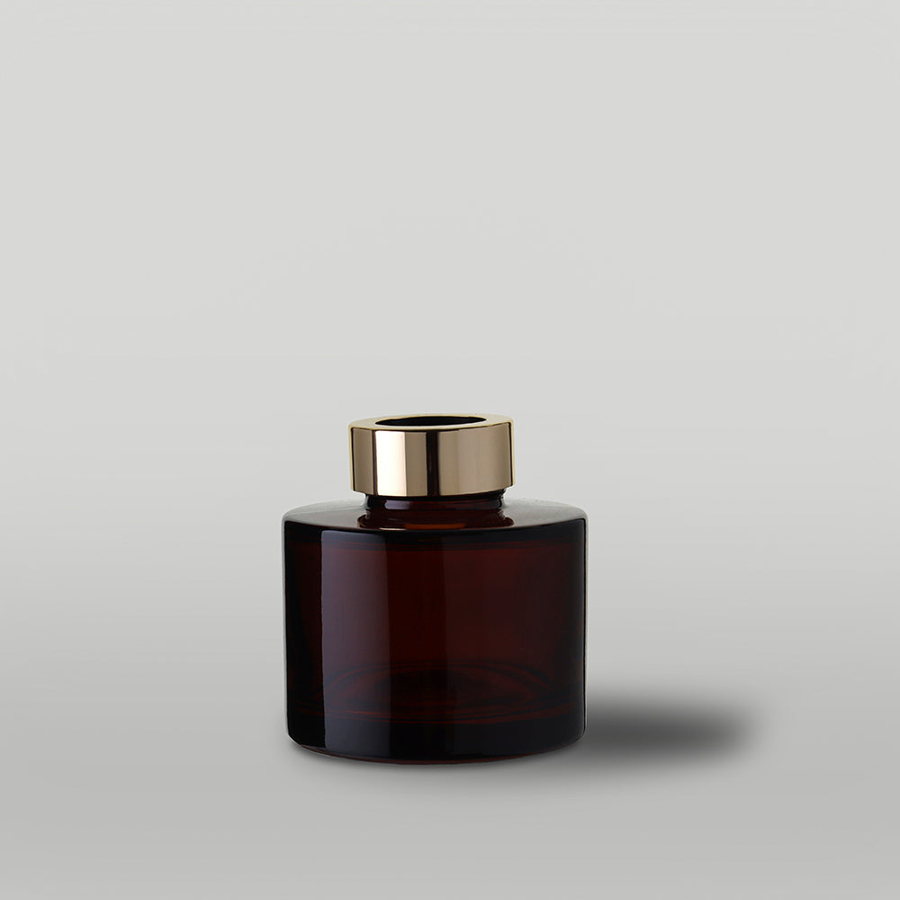 165ml amber diffuser bottle on a light gray background