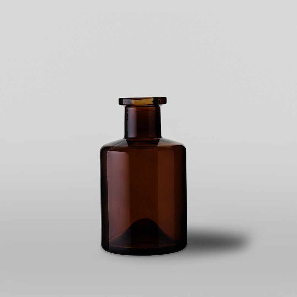 200ml Amber apothecary style diffuser bottle on a light gray background