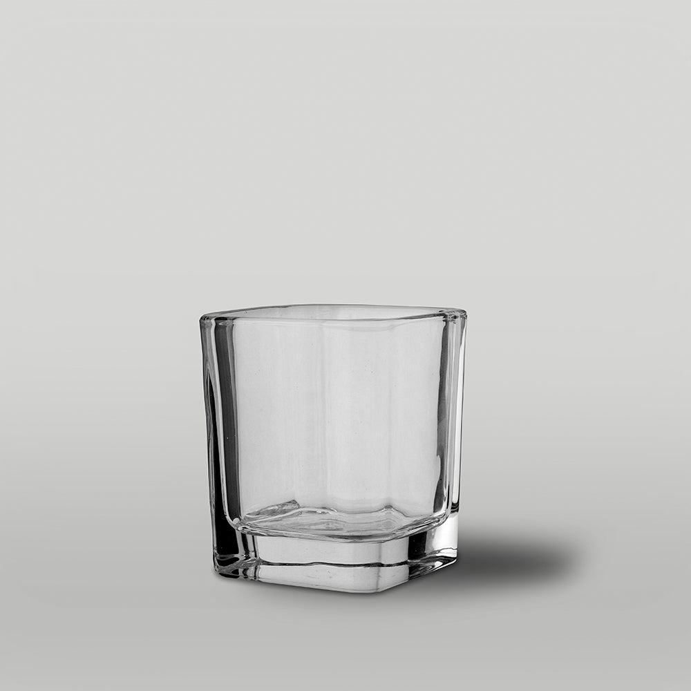 Clear 26cl Isla candle jar on a grey background