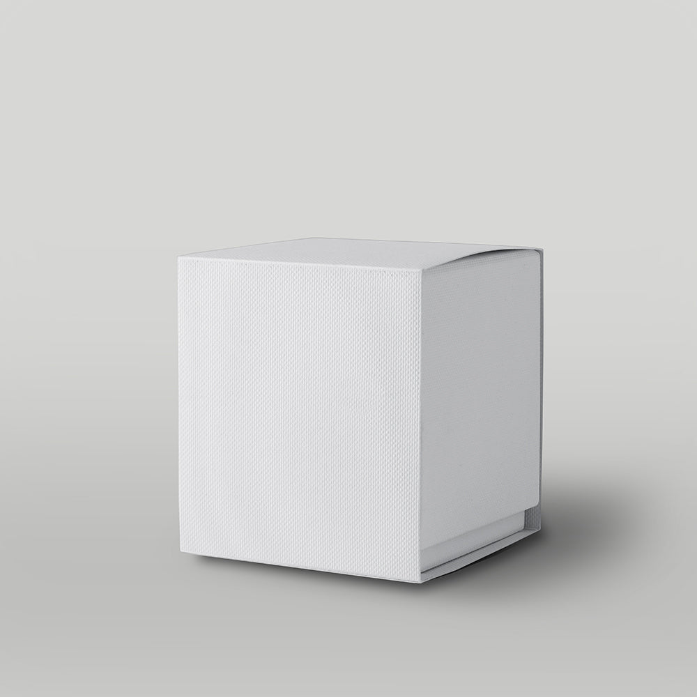White candle box on a light grey background