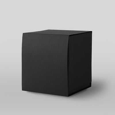 Black textured candle box on a light grey background