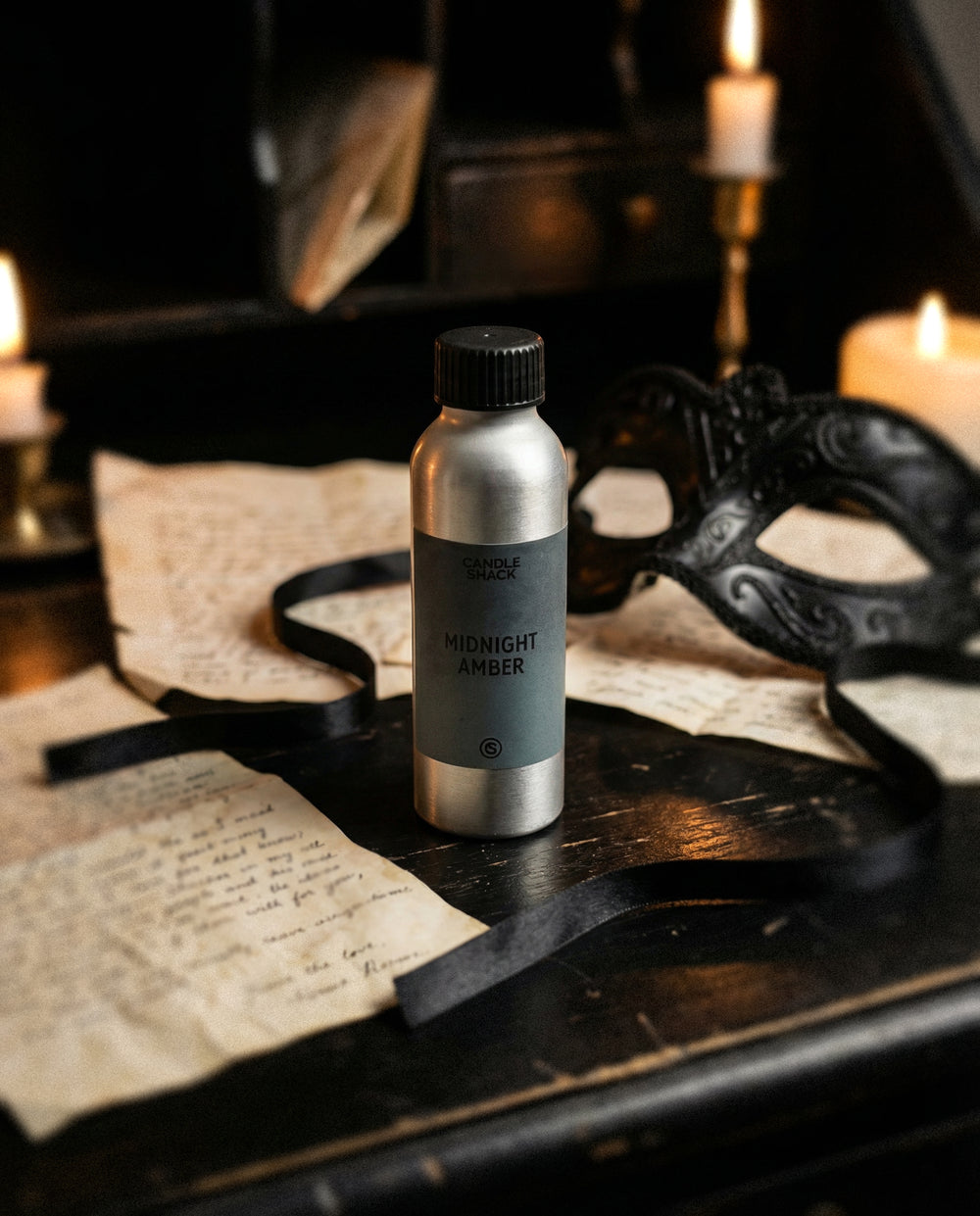 'Midnight Ember' fragrance oil, a dark and tempting scent of florals, amber and musk