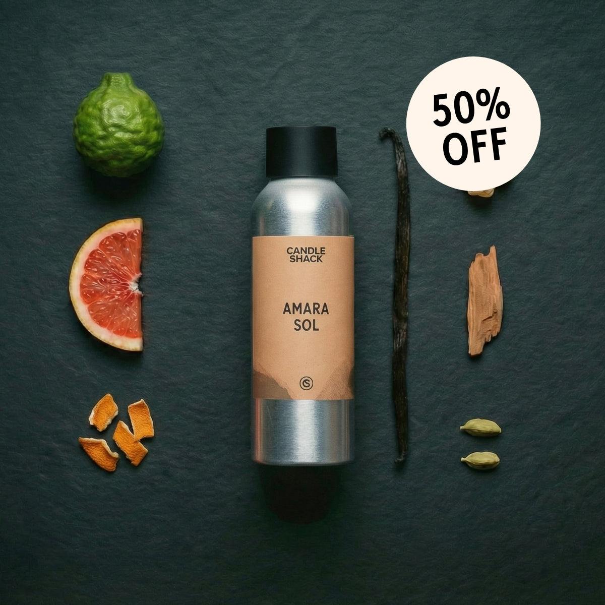 Candle Shack Amara Sol fragrance oil with ingredients on a dark surface and 50% off label.