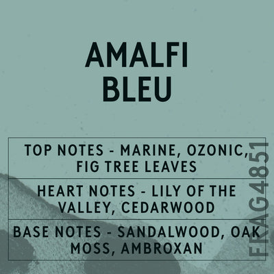 Amalfi Bleu fragrance oil - Candle Shack aluminium bottle with dried botanicals on a dark slate background