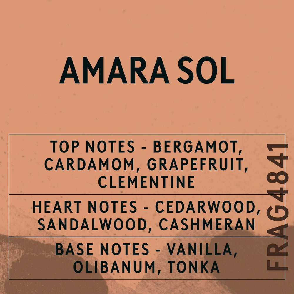 Amara Sol fragrance oil - Candle Shack aluminium bottle with dried botanicals on a dark slate background