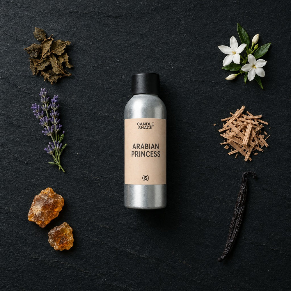 Arabian Princess fragrance oil - Candle Shack aluminium bottle with dried botanicals on a dark slate background