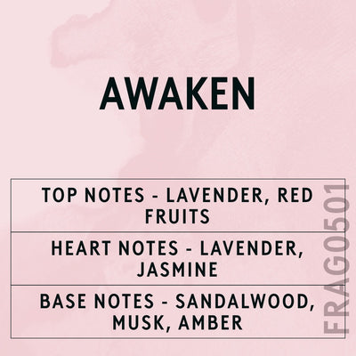 Awaken fragrance oil - Candle Shack aluminium bottle with dried botanicals on a dark slate background