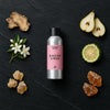 Black Iris & Musk fragrance oil - Candle Shack aluminium bottle with dried botanicals on a dark slate background