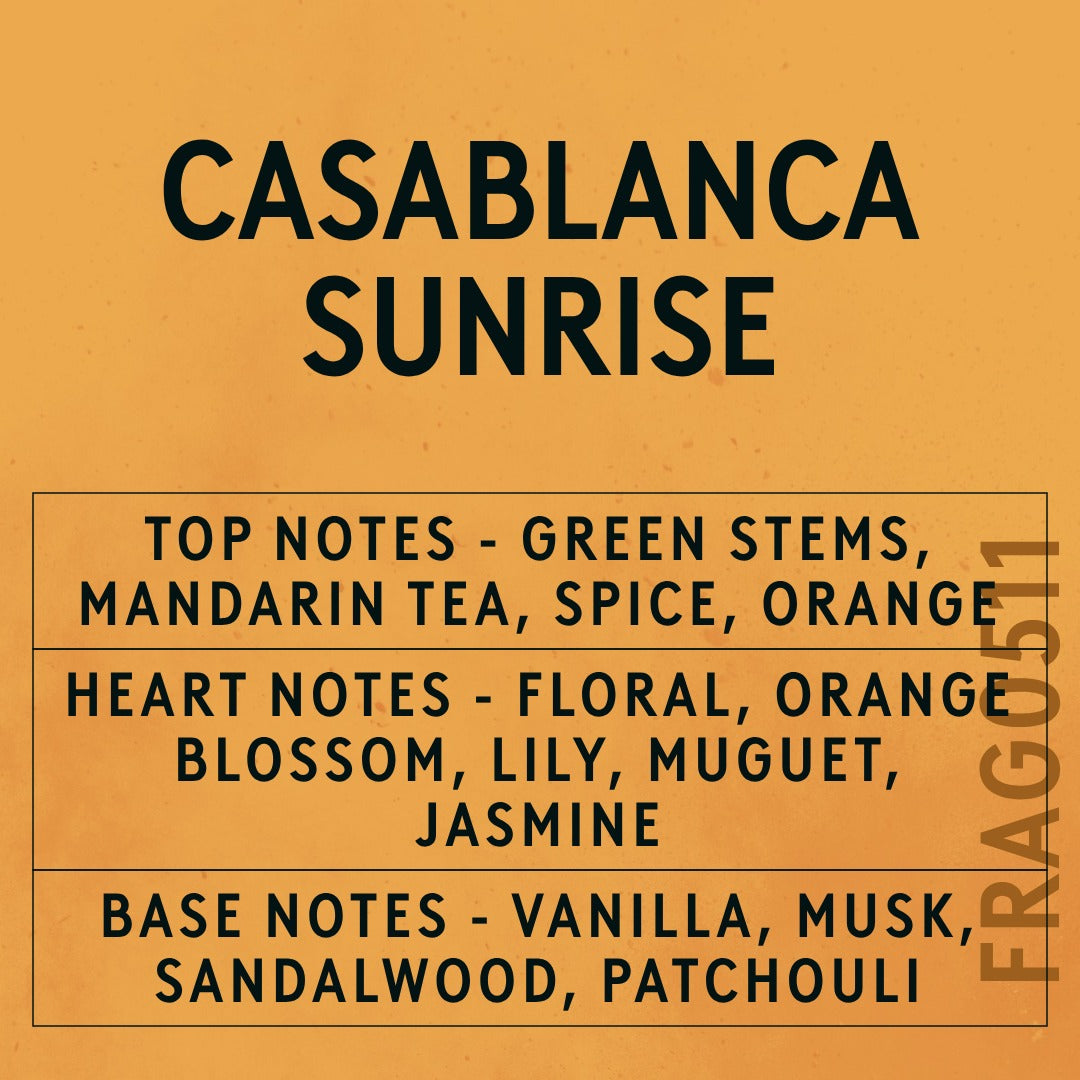 Casablanca Sunrise fragrance oil - Candle Shack aluminium bottle with dried botanicals on a dark slate background