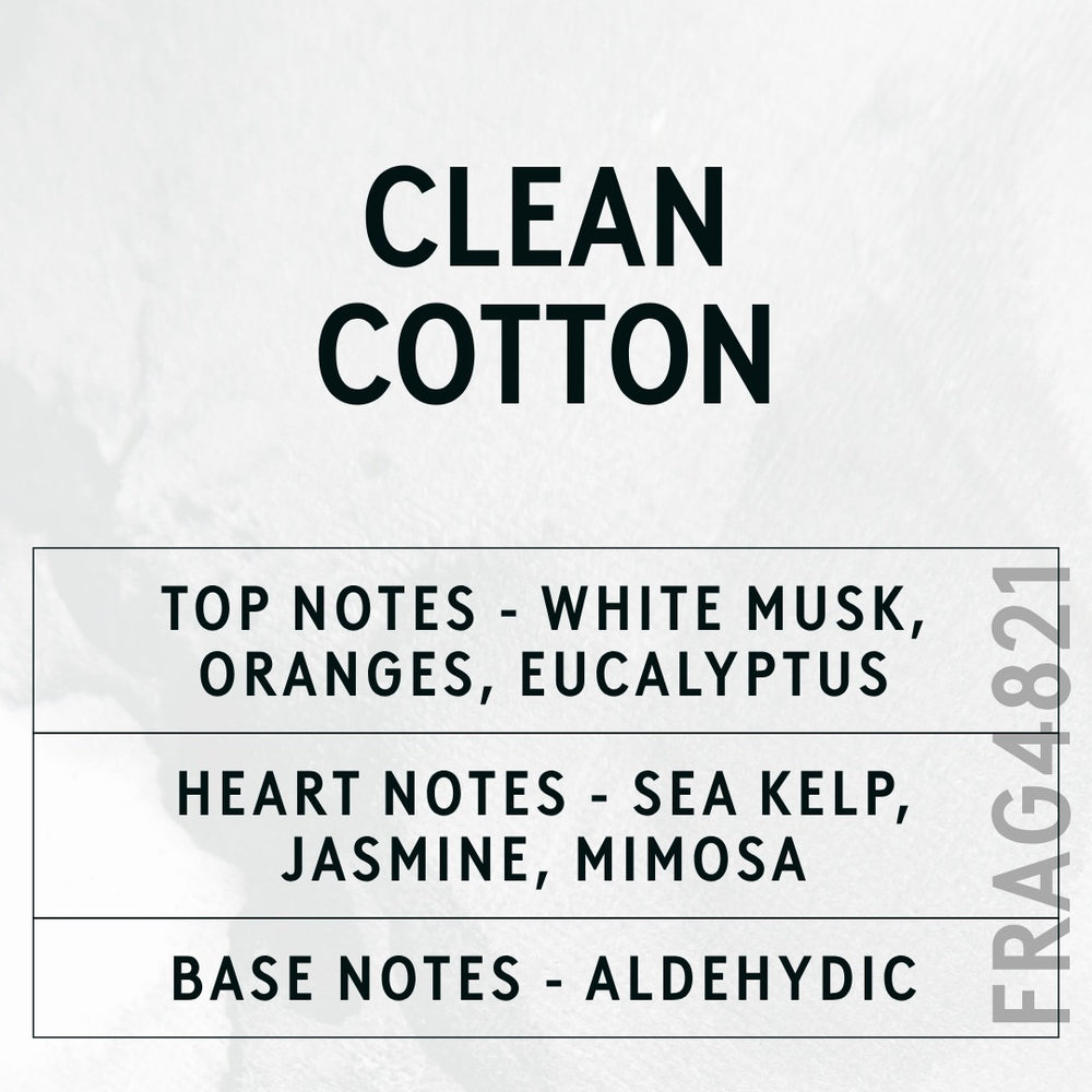 Clean Cotton fragrance oil - Candle Shack aluminium bottle with dried botanicals on a dark slate background