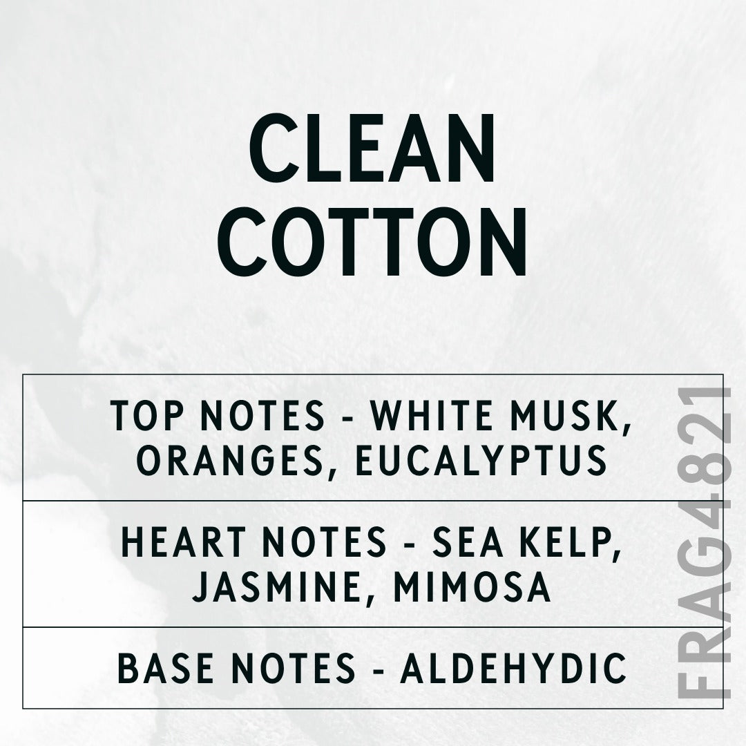 Clean Cotton fragrance oil - Candle Shack aluminium bottle with dried botanicals on a dark slate background