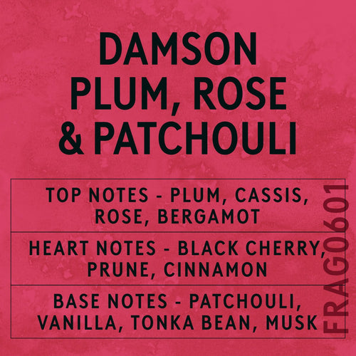 Damson Plum, Rose & Patchouli fragrance oil - Candle Shack aluminium bottle with dried botanicals on a dark slate background