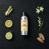 Eau Verbena fragrance oil - Candle Shack aluminium bottle with dried botanicals on a dark slate background