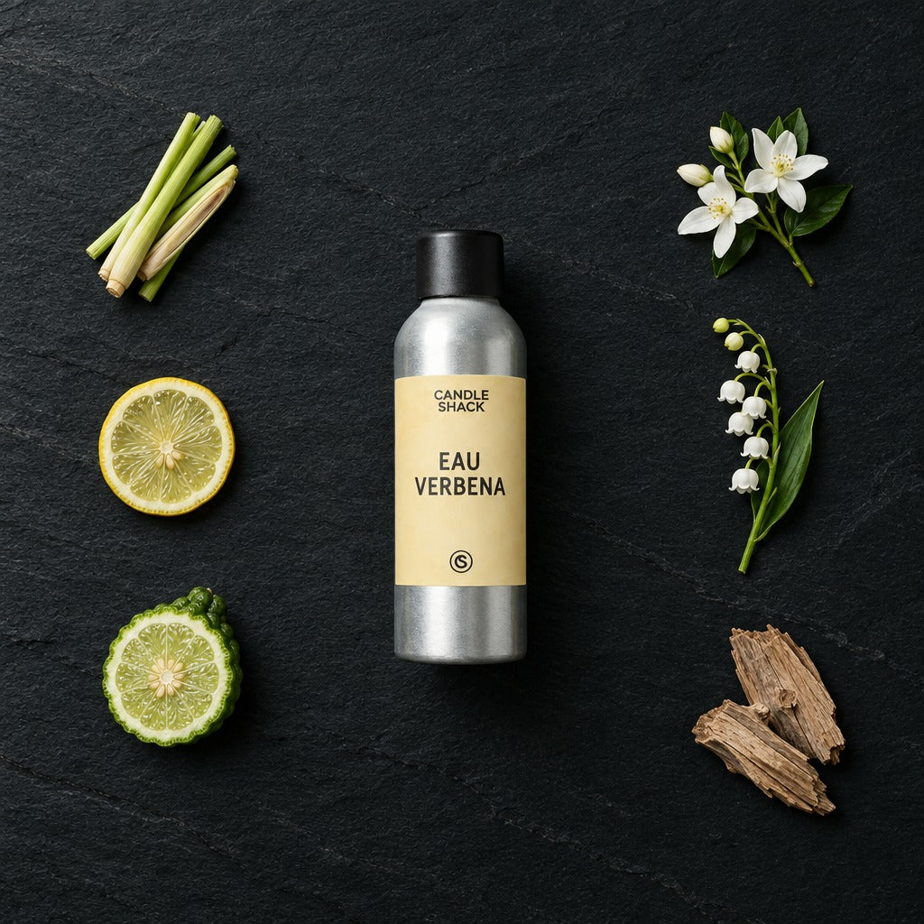 Eau Verbena fragrance oil - Candle Shack aluminium bottle with dried botanicals on a dark slate background