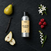 English Pear & Vanilla fragrance oil - Candle Shack aluminium bottle with dried botanicals on a dark slate background