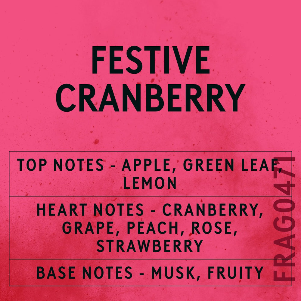 Festive Cranberry fragrance oil - Candle Shack aluminium bottle with dried botanicals on a dark slate background