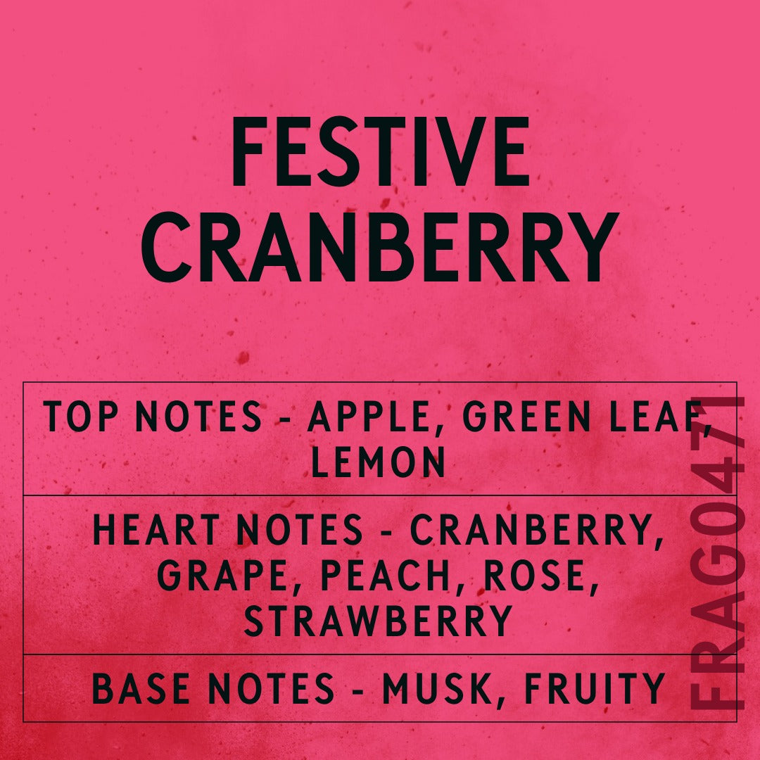 Festive Cranberry fragrance oil - Candle Shack aluminium bottle with dried botanicals on a dark slate background