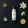 Fresh Linen fragrance oil - Candle Shack aluminium bottle with dried botanicals on a dark slate background