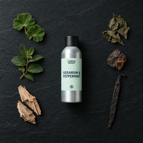 Geranium & Peppermint with Citrepel Insect Repellent fragrance oil - Candle Shack aluminium bottle with dried botanicals on a dark slate background