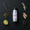 Lavender & Patchouli with Citrepel Insect Repellent fragrance oil - Candle Shack aluminium bottle with dried botanicals on a dark slate background