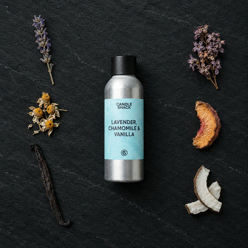 Lavender, Chamomile & Vanilla fragrance oil - Candle Shack aluminium bottle with dried botanicals on a dark slate background