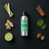 Lemongrass & Ginger Candle fragrance oil - Candle Shack aluminium bottle with dried botanicals on a dark slate background