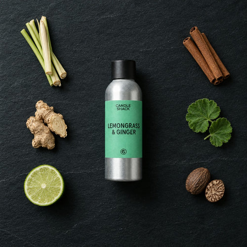 Lemongrass & Ginger Reed fragrance oil - Candle Shack aluminium bottle with dried botanicals on a dark slate background