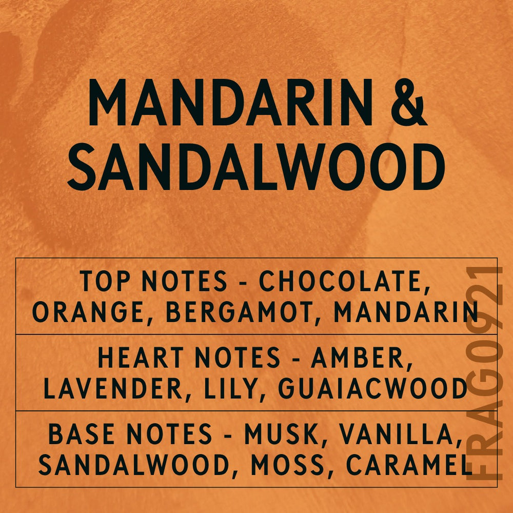 Mandarin & Sandalwood fragrance oil - Candle Shack aluminium bottle with dried botanicals on a dark slate background