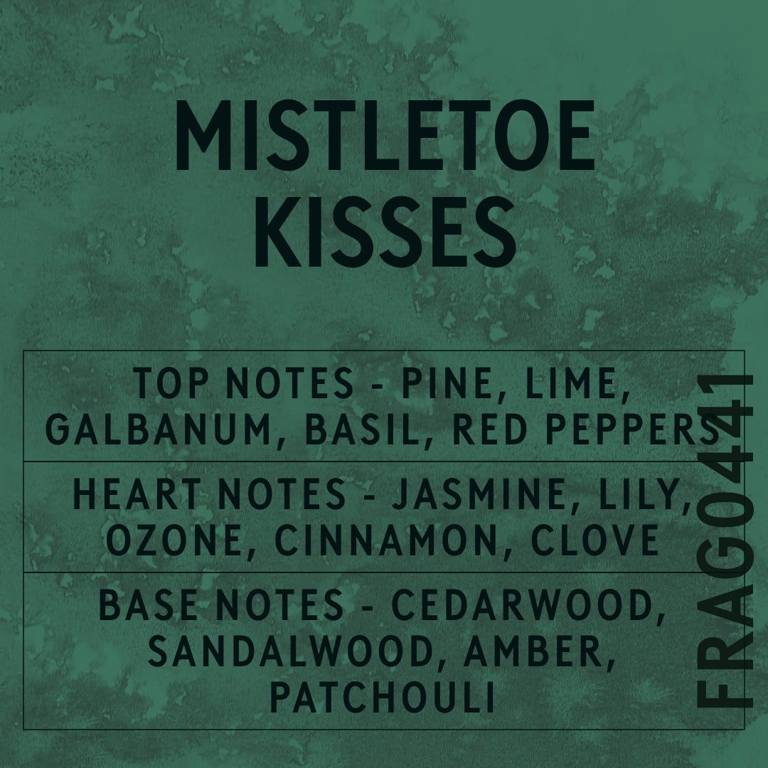 Mistletoe Kisses fragrance oil - Candle Shack aluminium bottle with dried botanicals on a dark slate background