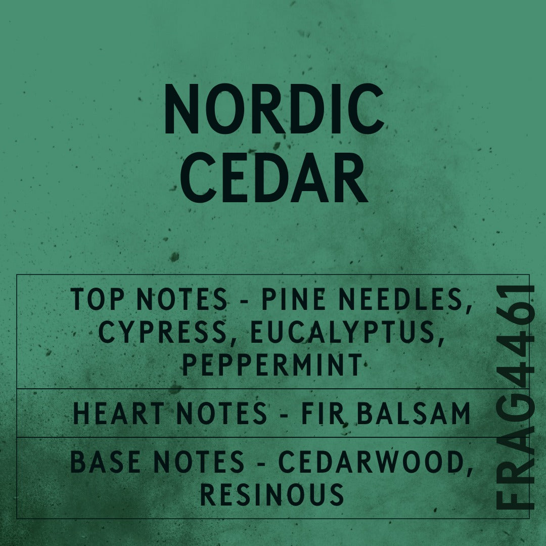 Nordic Cedar fragrance oil - Candle Shack aluminium bottle with dried botanicals on a dark slate background