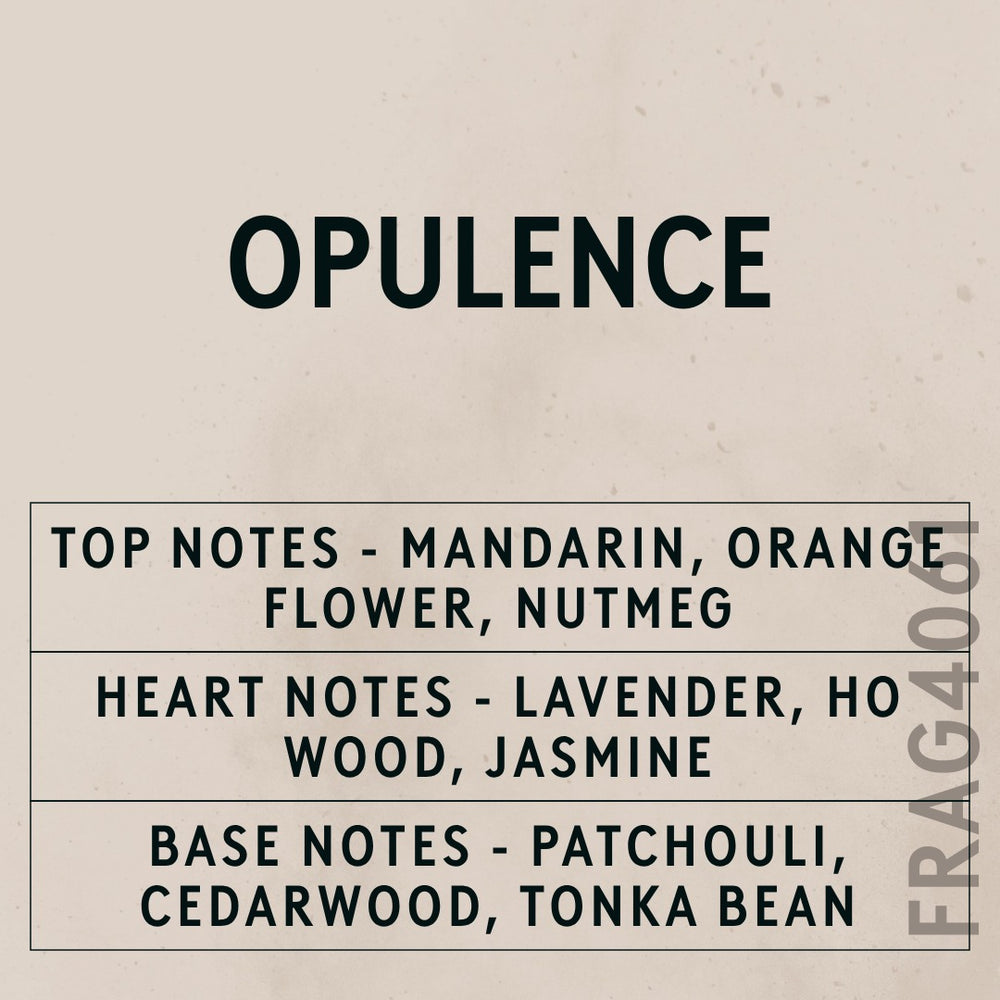 Opulence Natural Oil fragrance oil - Candle Shack aluminium bottle with dried botanicals on a dark slate background