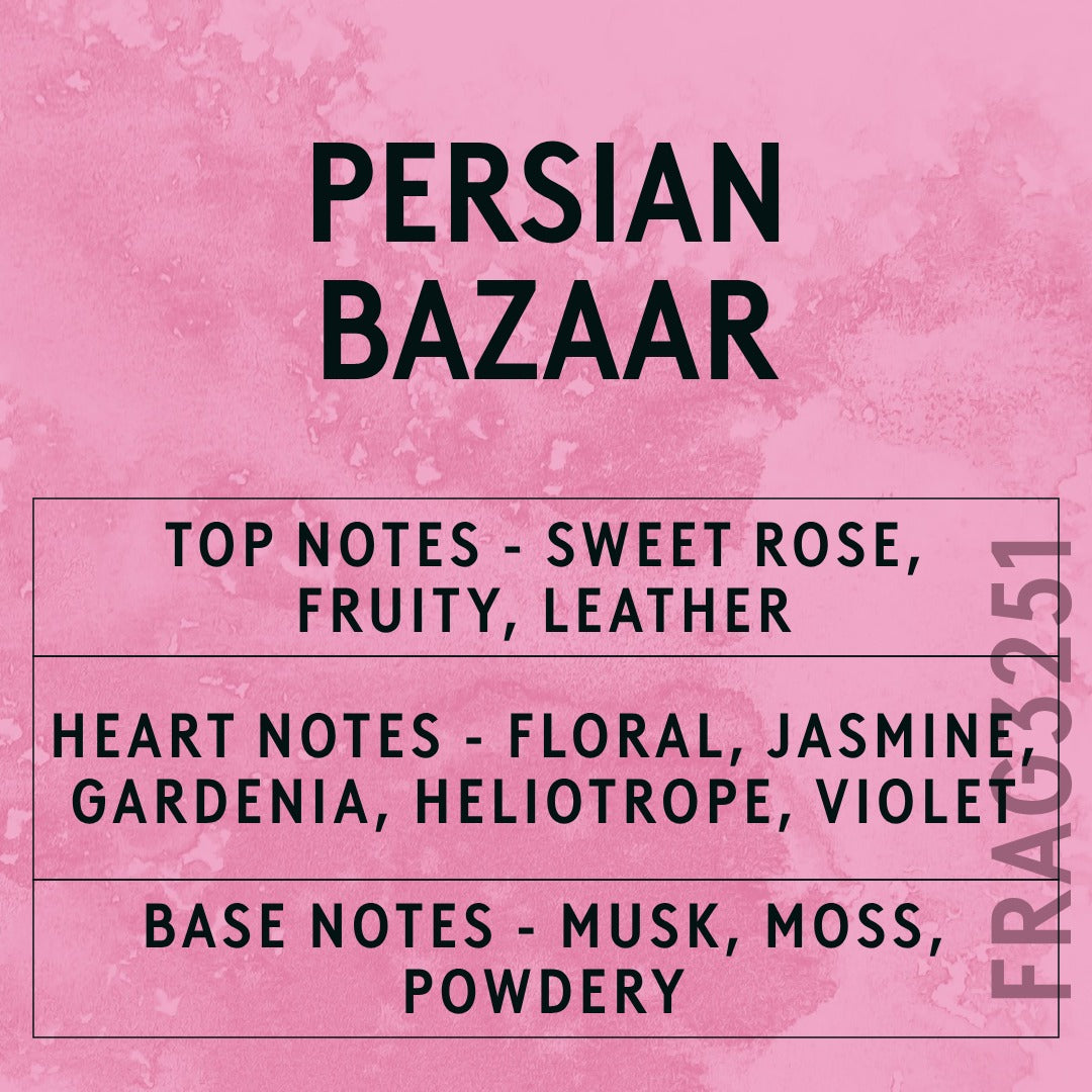 Persian Bazaar fragrance oil - Candle Shack aluminium bottle with dried botanicals on a dark slate background