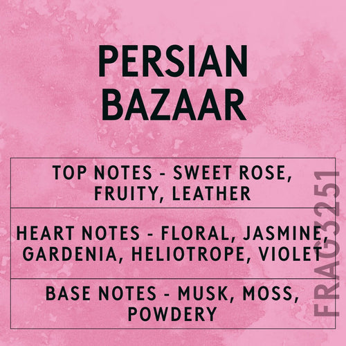 Persian Bazaar fragrance oil - Candle Shack aluminium bottle with dried botanicals on a dark slate background