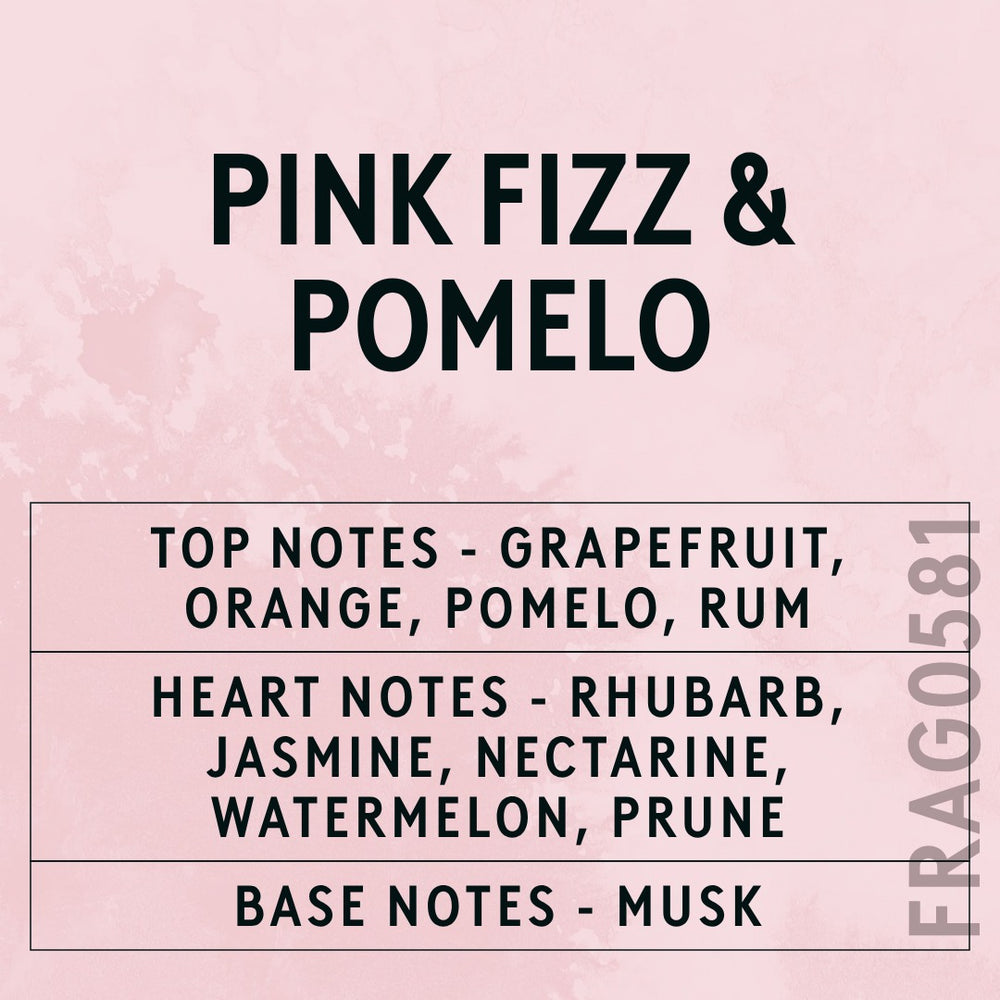 Pink Fizz & Pomelo fragrance oil - Candle Shack aluminium bottle with dried botanicals on a dark slate background