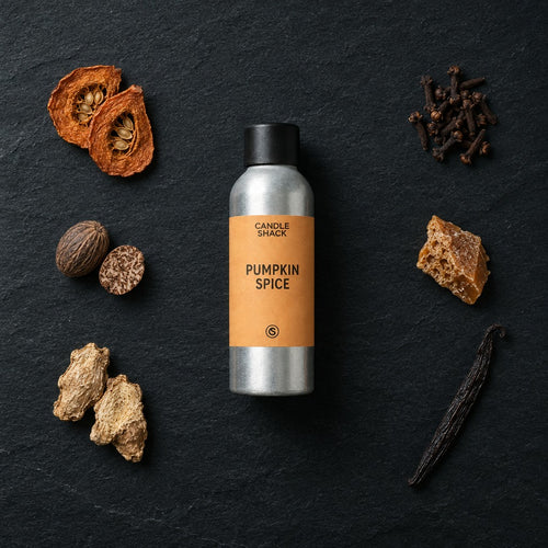 Pumpkin Spice fragrance oil - Candle Shack aluminium bottle with dried botanicals on a dark slate background