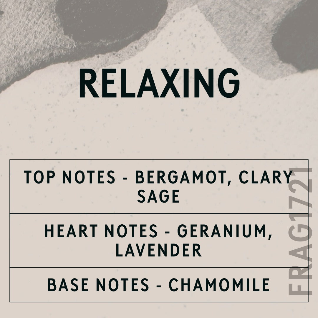 Relaxing Natural Oil fragrance oil - Candle Shack aluminium bottle with dried botanicals on a dark slate background