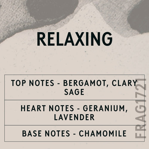 Relaxing Natural Oil fragrance oil - Candle Shack aluminium bottle with dried botanicals on a dark slate background