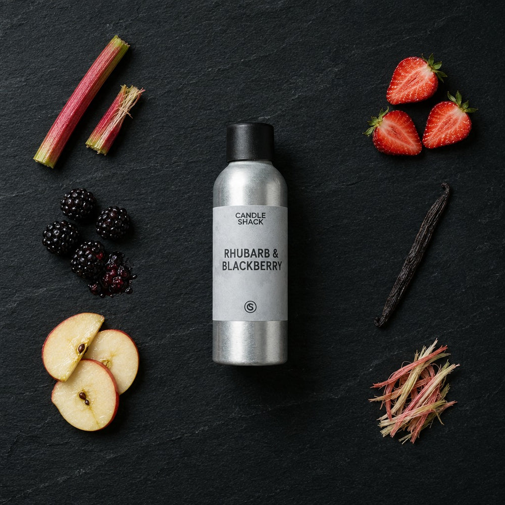 Rhubarb & Blackberry fragrance oil - Candle Shack aluminium bottle with dried botanicals on a dark slate background