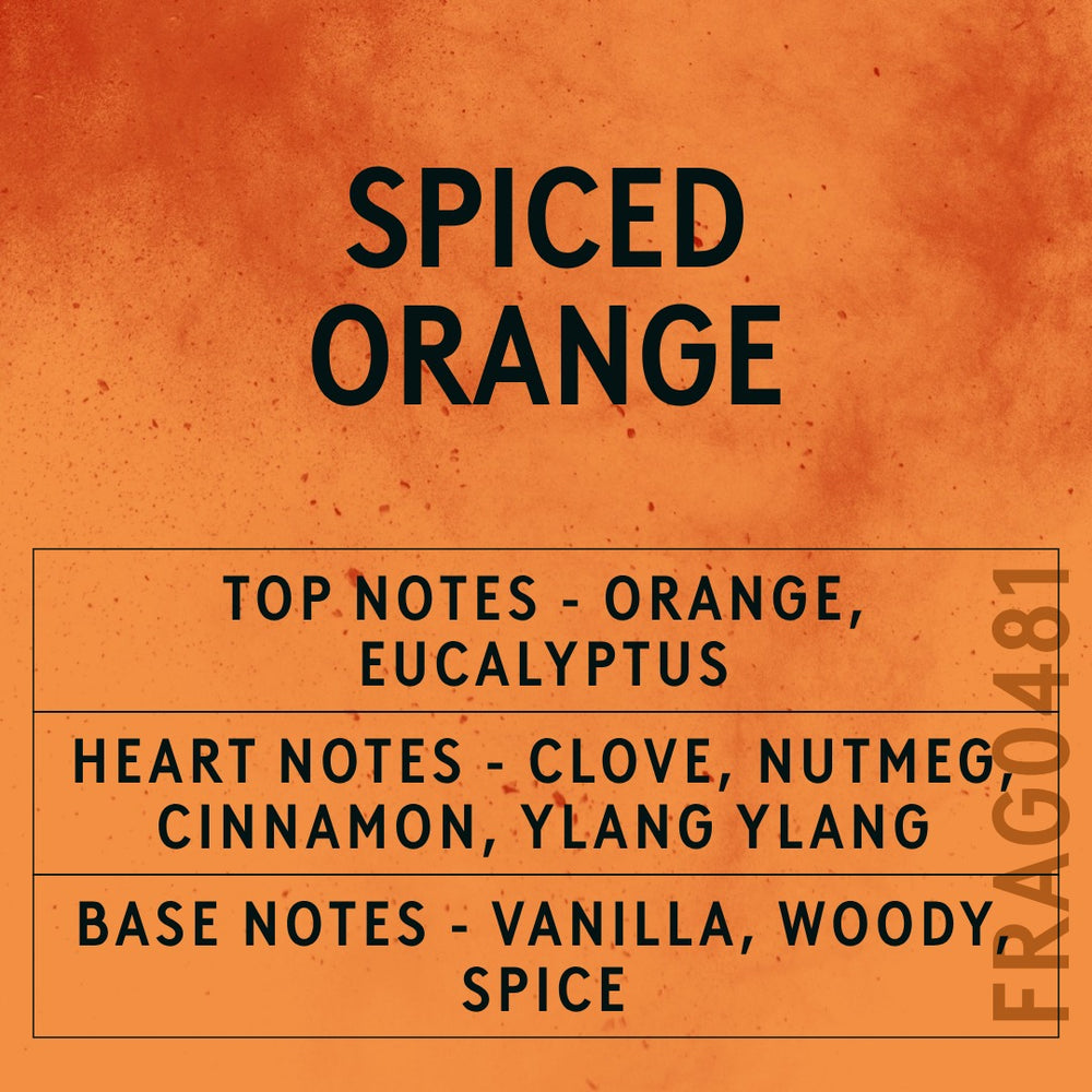 Spiced Orange fragrance oil - Candle Shack aluminium bottle with dried botanicals on a dark slate background