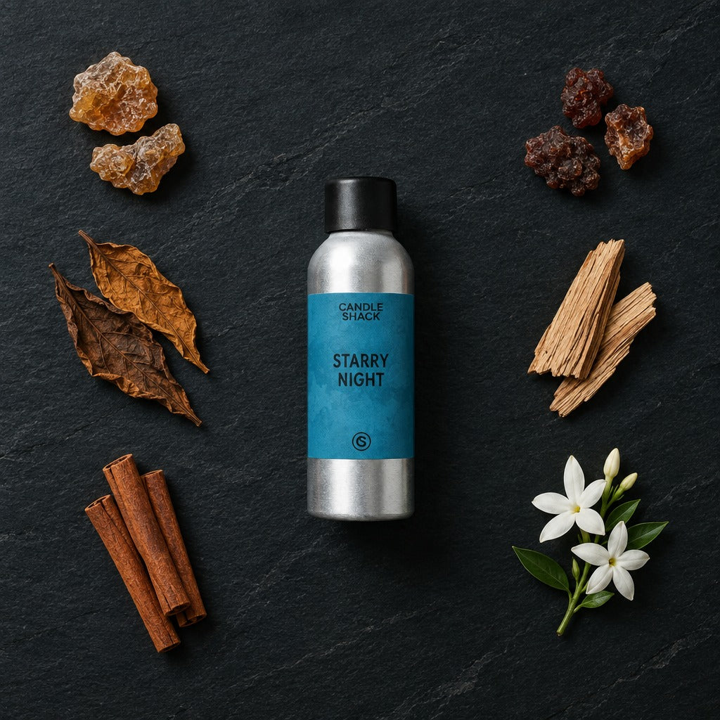 Starry Night fragrance oil - Candle Shack aluminium bottle with dried botanicals on a dark slate background