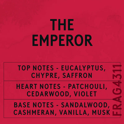 The Emperor fragrance oil - Candle Shack aluminium bottle with dried botanicals on a dark slate background