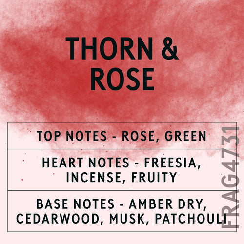 Thorn & Rose fragrance oil - Candle Shack aluminium bottle with dried botanicals on a dark slate background