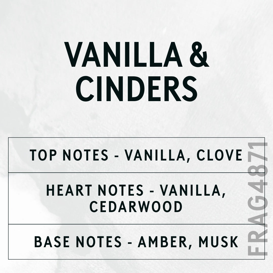Vanilla & Cinders fragrance oil - Candle Shack aluminium bottle with dried botanicals on a dark slate background