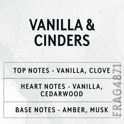 Vanilla & Cinders fragrance oil - Candle Shack aluminium bottle with dried botanicals on a dark slate background