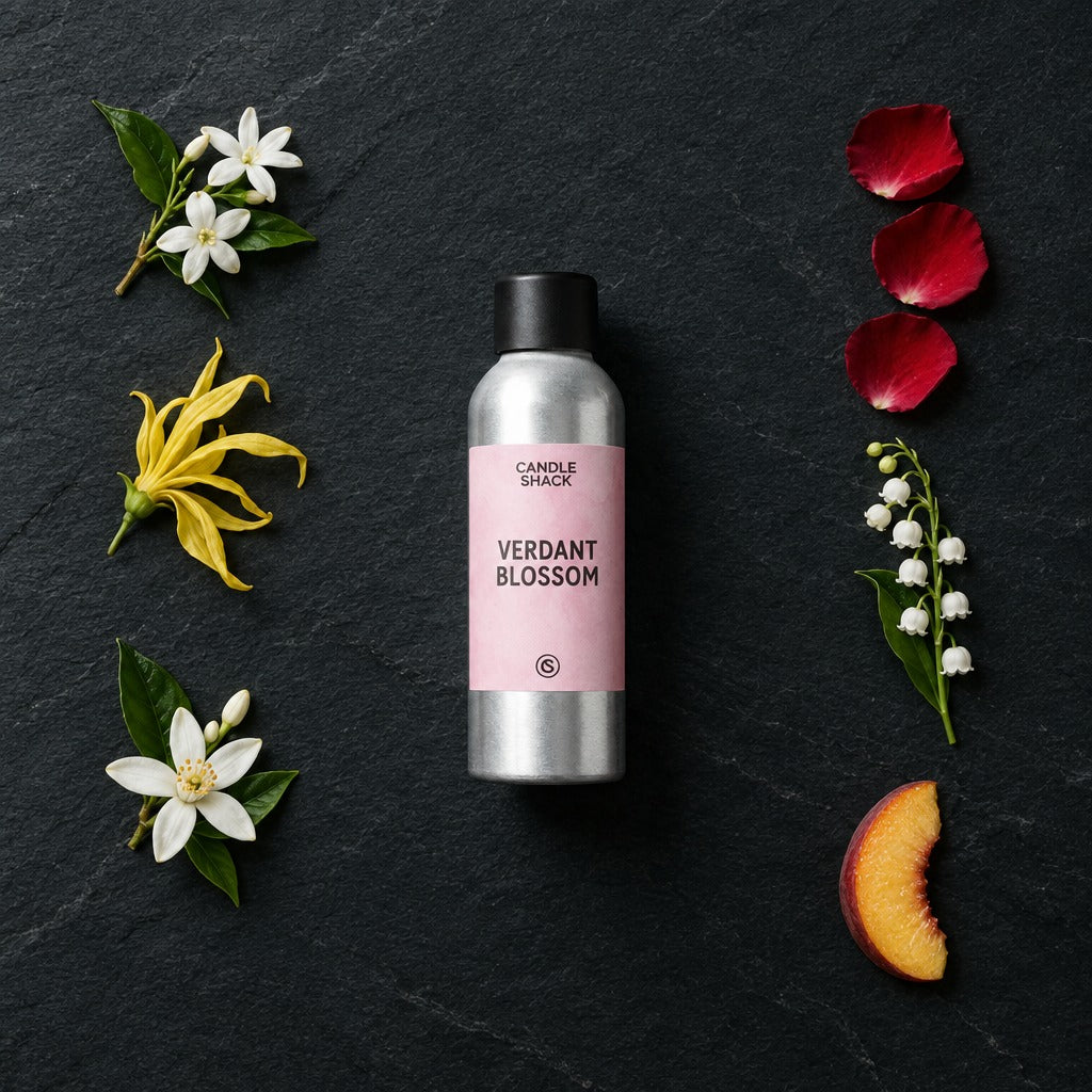 Verdant Blossom fragrance oil - Candle Shack aluminium bottle with dried botanicals on a dark slate background
