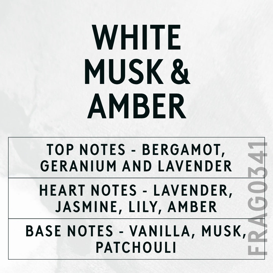 White Musk & Amber fragrance oil - Candle Shack aluminium bottle with dried botanicals on a dark slate background