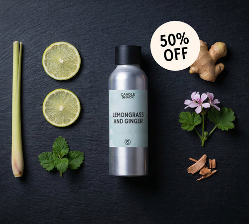 Candle Shack Lemongrass and Ginger fragrance oil with lemongrass, lime, ginger, and flowers on a dark background.